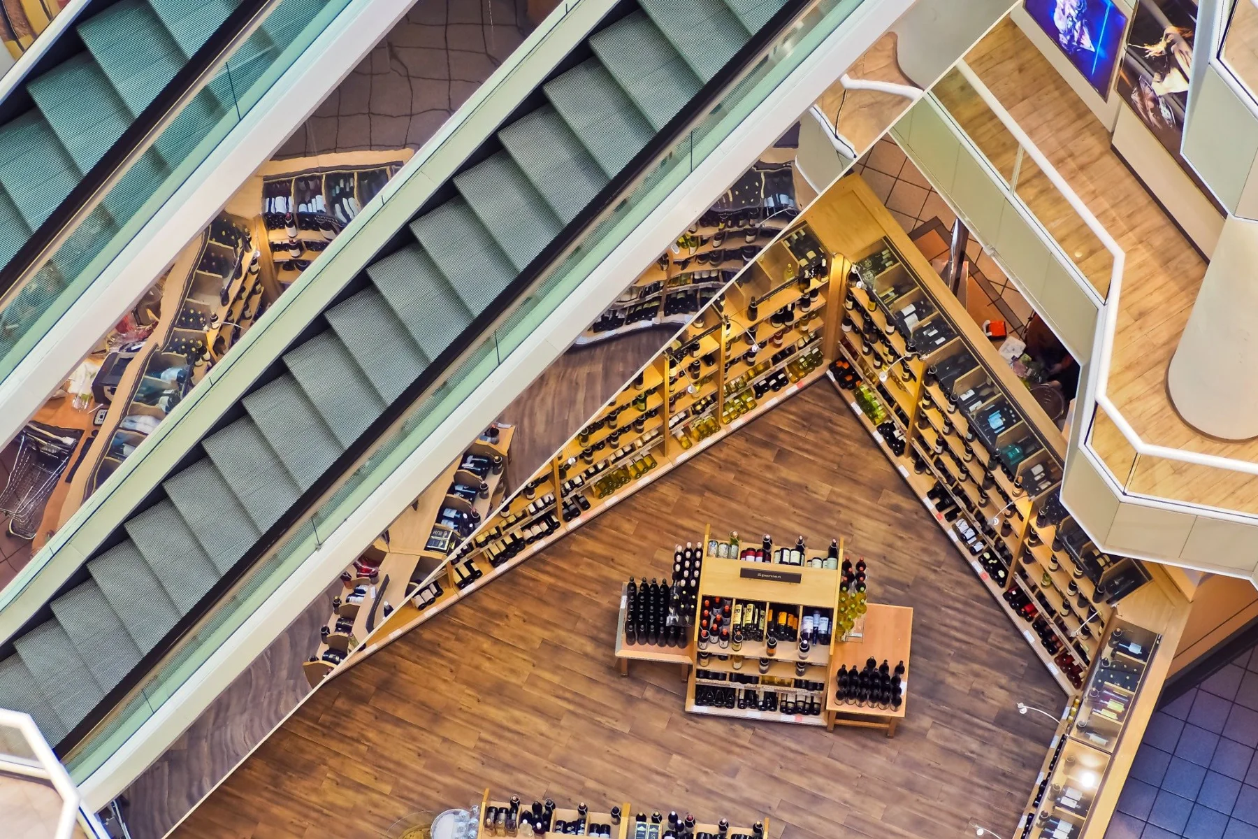 An overhead view of a vibrant retail space with wooden floors